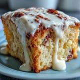 Perfect slice of Heavenly Blood Orange Yogurt Cake served with tea and fresh berries on a bright morning.
