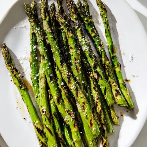 Imagine tender Grilled Asparagus, lightly charred with a squeeze of fresh lemon, on your plate.